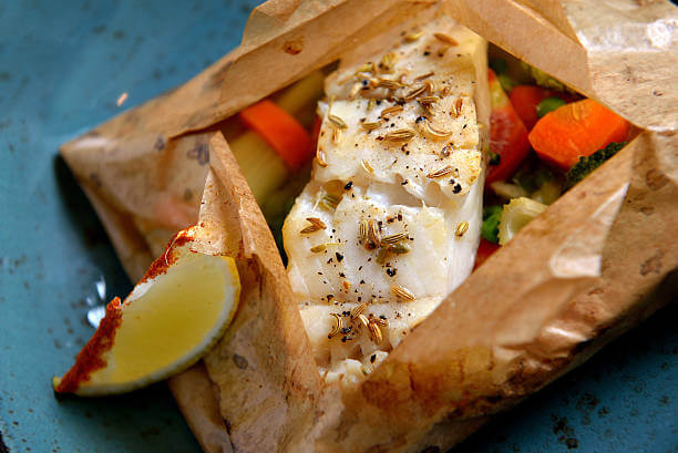 Cod with vegetables in a package